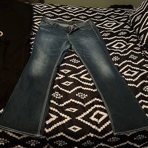 Suki mid slim boot slivers 34x 33 used